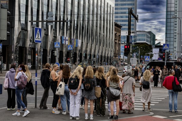 Lively city center of Tallinn on Narva Maantee with modern architecture and crowds, Tallinn, Estonia