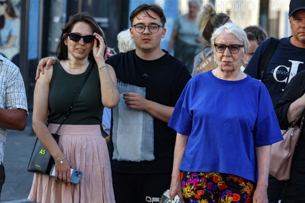Three people wearing casual clothes in an urban environment in Tallinn, Tallinn, South Alinn, Estonia