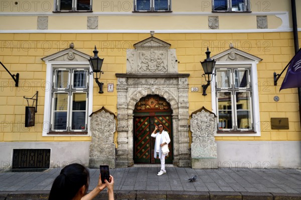 The magnificent façade of the Guild House in the Old Town attracts tourists with its architecture, Tallinn, Harju, Estonia