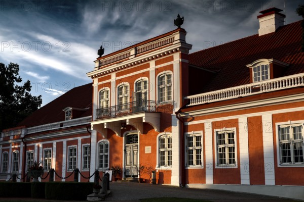 Baroque style manor house in Sagadi with red roof in picturesque rural area, Sagadi, Estonia
