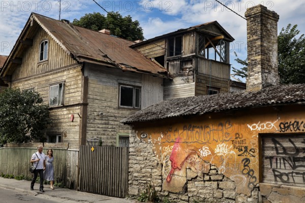 Various wooden houses decorated with graffiti in Kelmiküla Tallinn, Tallinn, Harju, Estonia