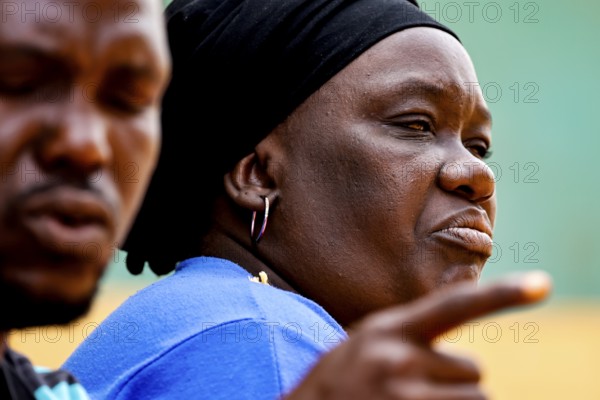 Close-up of Rokia talking during a house visit to CI, Korhogo, CI, Côte d'Ivoire