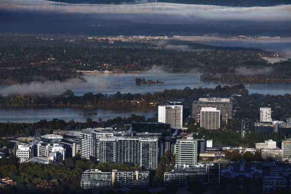 View of Canberra CBD from Mount Ainslie Lookout in the morning with fog fields over the lake, Canberra, Australian Capital Territory, Australia