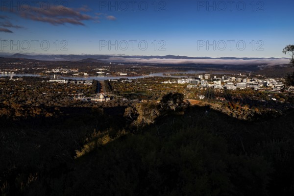 Panoramic view of Canberra from Mount Ainslie Lookout, framed by wide sky and clouds, Canberra, Australian Capital Territory, Australia
