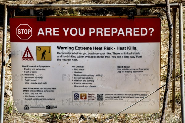 Warning sign in Bell Gorge warning of extreme heat and safety measures, Bell Gorge, Australia