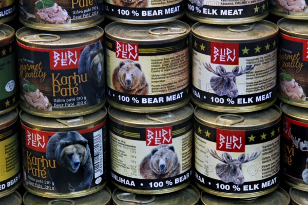 Interior view of a market hall with detailed canned goods with bear meat labels, Helsinki, Finland