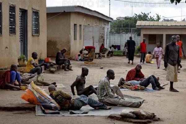 Patients in an open courtyard as part of their daily routines in Bouaké, Bouaké, Saint Camille, Nimbo, Côte d'Ivoire