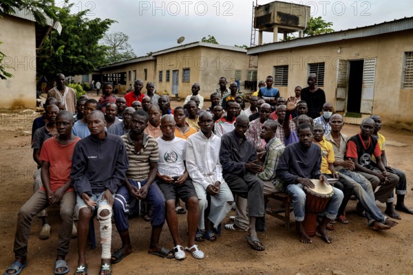 Patients sing together outdoors as part of their therapy in Bouaké, Bouaké, Saint Camille, Nimbo, Côte d'Ivoire