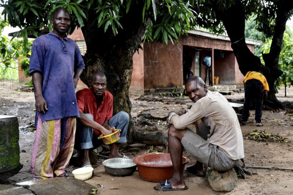 Patients relax in the courtyard of a psychiatric rehabilitation center for men in Dar Es Salam, CI Bouaké, Dar Es Salam, Ivory Coast