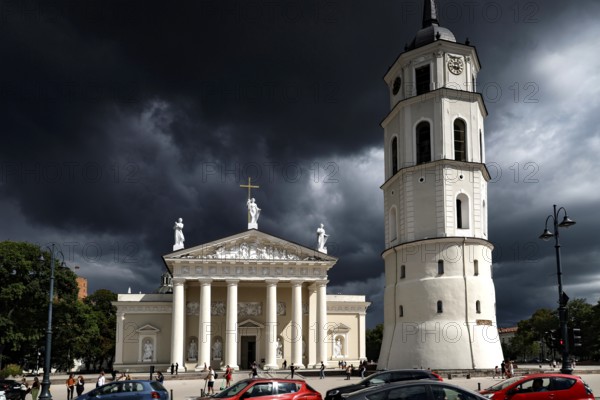 Drama of cathedral and bell tower under dark clouds, Vilnius, Lithuania