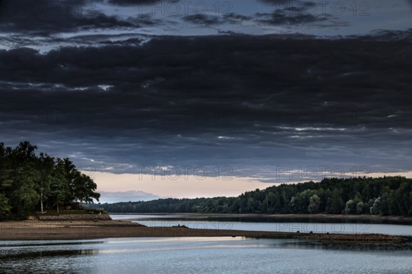 View of the Duna (Daugava) with forested bank and clouds, Koknese, Daugava, Latvia