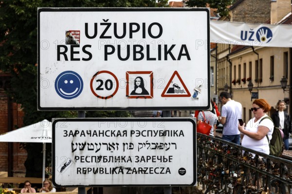 Užupis Republic border sign with pictograms and multilingual inscriptions, Vilnius, Užupis, Lithuania