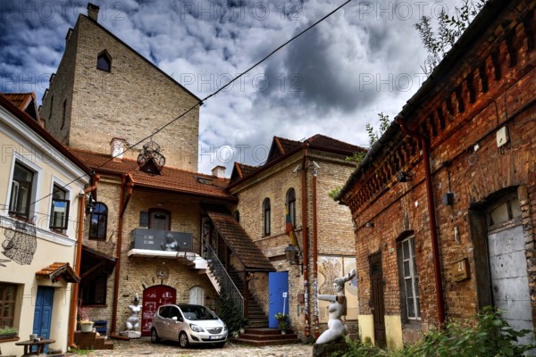 Courtyard view with old brick building and art studio in Vilnius' Užupis district, Vilnius, Užupis, Lithuania