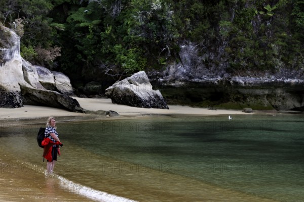 Picturesque corner of Anchorage Bay with calm waters and rock formations, zero