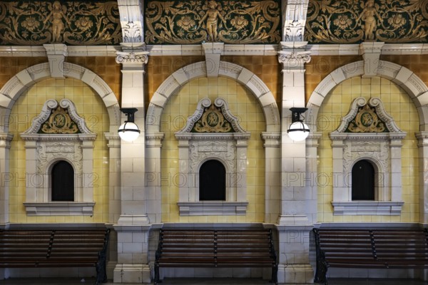 Elegant historic architecture of Dunedin railway station with benches, Dunedin, null, New Zealand