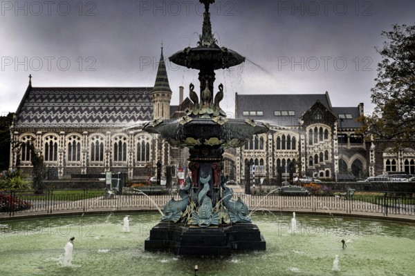 Impressive fountain in front of the Canterbury Museum in Christchurch under cloudy sky, Christchurch, Canterbury, New Zealand