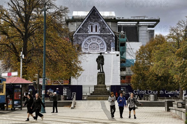 Cathedral and monument at Cathedral Square in Christchurch with passers-by, Christchurch, Canterbury, New Zealand