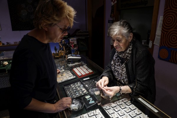 Opal sales scene at Opalios opal store in Coober Pedy, Coober Pedy, South Australia, Australia