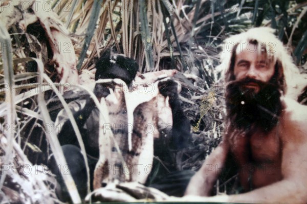 Portrait of Crocodile Harry amidst thick bushes in Coober Pedy, Coober Pedy, South Australia, Australia