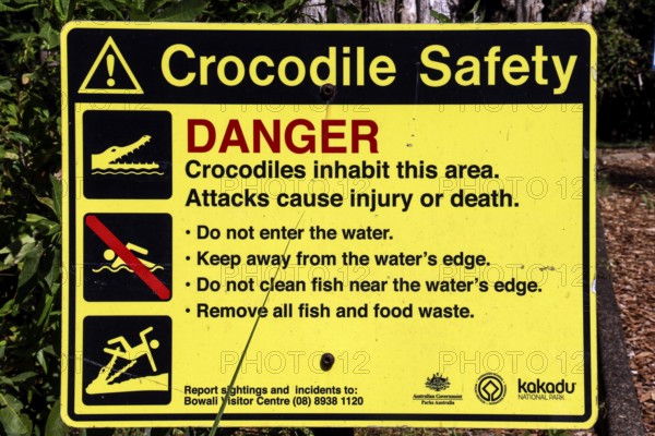 Crocodile safety warning sign in Kakadu National Park, Kakadu National Park, Northern Territory, Australia