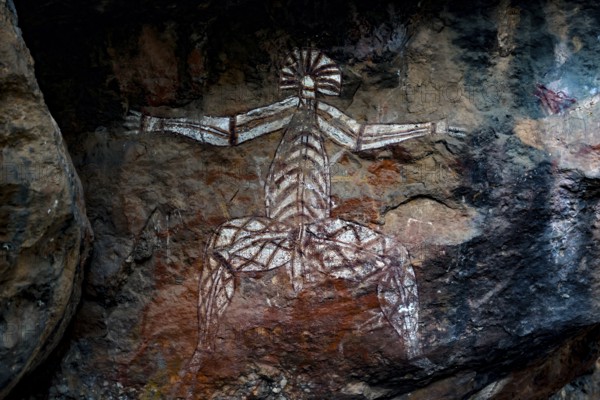 Aboriginal rock painting depicting a mystical figure with outstretched arms, Nourlangie, Northern Territory, Australia