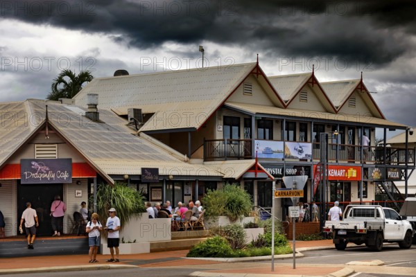 Lively street scene with shops and people on Carnarvon Street, Broome, Western Australia, Australia