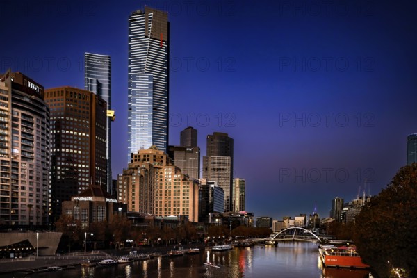 Illuminated Melbourne skyline on Yarra River at night, Melbourne, Victoria, Australia