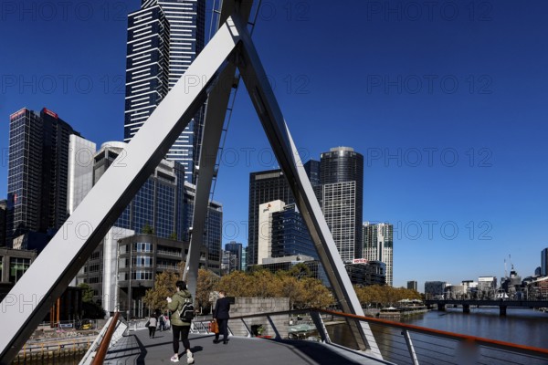 View of Melbourne's skyline from Sandridge Bridge under clear sky, Melbourne, Victoria, Australia