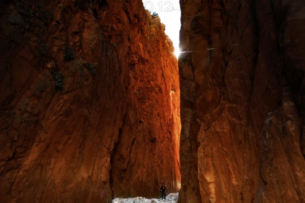Impressive red rocks of Standley Chasm with dramatic light incidence, Standley Chasm, Northern Territory, Australia