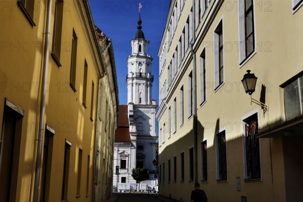 Kaunas Town Hall viewed through a shady alley on sunny Town Hall Square, Rathausplatz, Rathausplatz, Kaunas, Kaunas, Lithuania