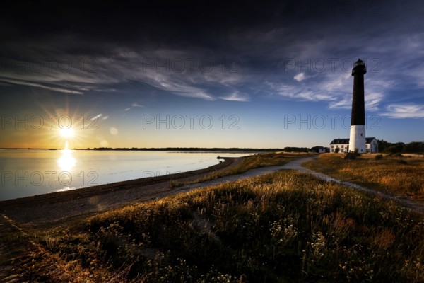 Lighthouse on the Särve peninsula at dusk with a view of the beach, Särve, Estonia