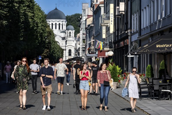 Laisves aleja in Kaunas with passers-by and the Church of Archangel Michael in the background, Kaunas, null, Lithuania