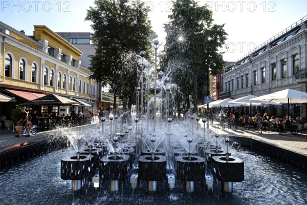 Lively fountain on Laisves aleja in sunny weather, Kaunas, LT