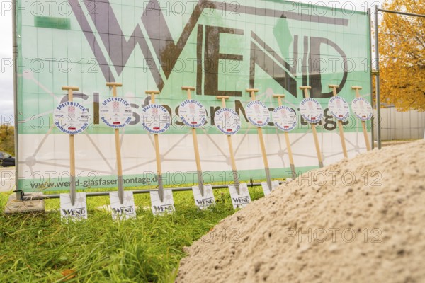 Signs announcing a broadband expansion are lined up in front of a construction fence, fibreglass groundbreaking, Dornstetten, Freudenstadt, Germany