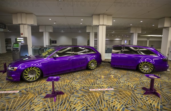 Detroit, Michigan USA - 13 January 2026 - KPMF showed a purple vehicle with Lionhart Tires and an eco-hitch to a matching trailer at the Detroit Auto Show