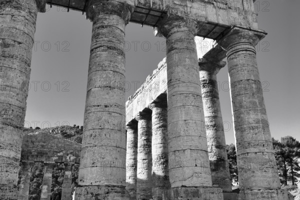 Elymian Doric Temple, ruin, monochrome, ancient city of Segesta, archaeological site, Calatafimi, Trapani province, northwest, Sicily, southern Italy, Italy