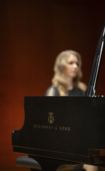 Young woman, pianist playing on a Steinway & Sons grand piano, Stuttgart, Baden-Württemberg, Germany