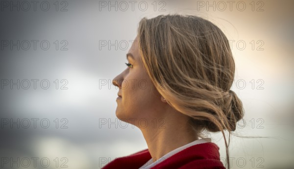The face of a young woman in profile, in the evening light, Stuttgart, Baden-Württemberg, Germany