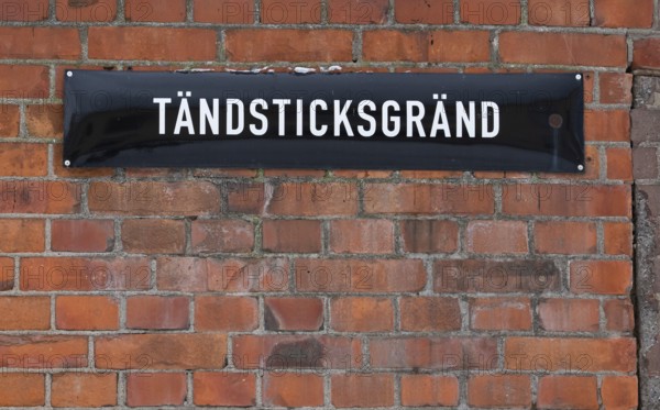 Street sign Tändsticksgränd on brick wall, Tändsticksmuseet match museum or match museum, Jönköping, Jönköpings län, Sweden