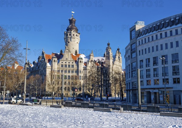 New Town Hall, monument by Hugo Licht, in winter with snow, Leipzig, Saxony, Germany