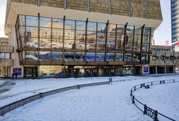 Gewandhaus façade with reflection of Augustusplatz in winter with snow, Leipzig, Saxony, Germany