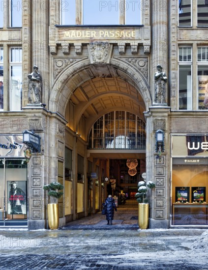 Grimmaische Straße entrance, historic Mädlerpassage shopping arcade in winter with snow, Leipzig, Saxony, Germany