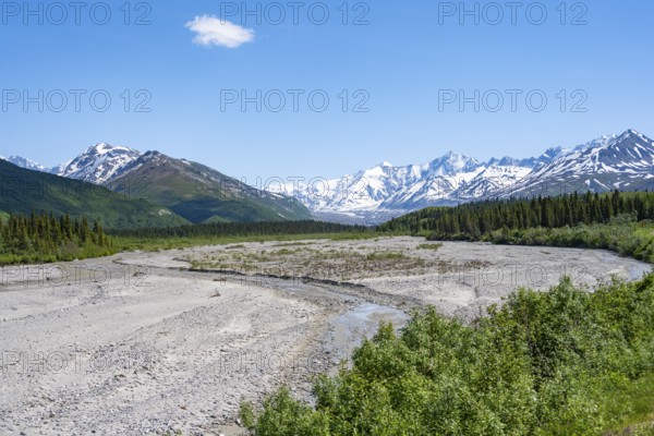 Mountain peak with snow and river, Alaska Range, Richardson Highway, Alaska, USA