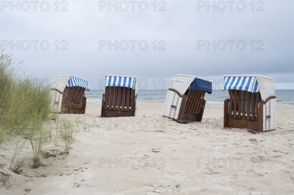 Abandoned beach chairs on sandy beach, Baltic resort Göhren, Baltic Sea, Rügen island, Mecklenburg-Western Pomerania, Germany