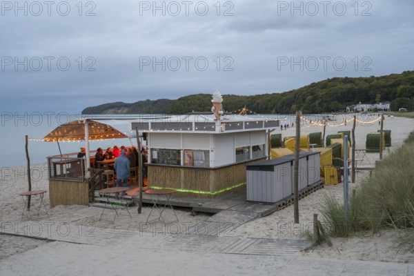 Illuminated beach bar, dusk, Binz, seaside resort, Rügen island, Baltic Sea, Mecklenburg-Western Pomerania, Germany