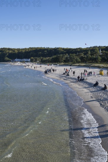 Tourists on the beach in autumn, Binz, seaside resort, Rügen island, Baltic Sea, Mecklenburg-Western Pomerania, Germany
