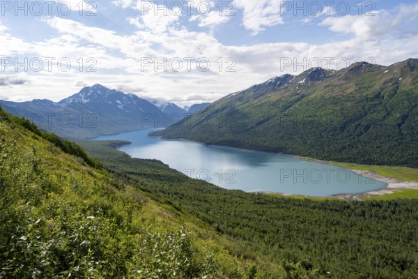 View of blue lake and mountains on Twin Peaks Trail, Eklutna Lake, Chugach Mountains, Chugach State Park, Alaska, USA