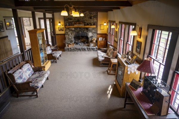 Interior view, living room in Manager's House, now Visitor Center, former Gold Mine Independence Mine building in mountainous landscape, Independence Mine State Historical Park, Hatcher Pass, Talkeetna Mountains, Alaska, USA