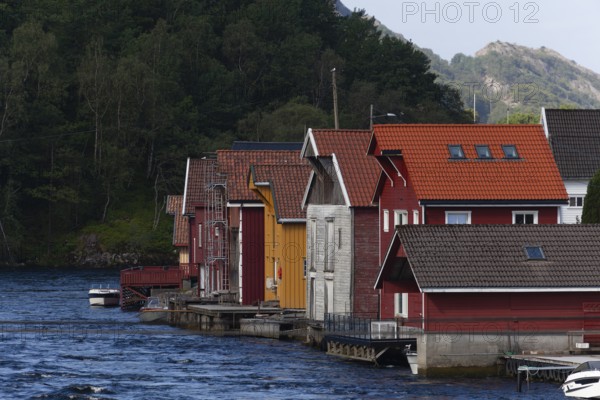 Historical wooden houses in a sleepy village by the river. Summer, Sireåna (Sireåna), Agder, Norway