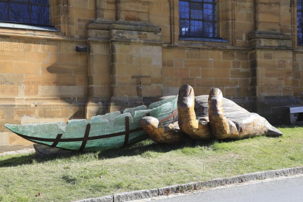 The glass ark, artists Ronald Fischer and Hubert Stern, a five metre long art object supported by a wooden hand, artists Tomas Indra and Libor Kuzdas. Here at a station in front of the Vierzehnheiligen pilgrimage church, Lichtenfels district, Upper Franconia, Bavaria, Germany (permanent work of art in public space)